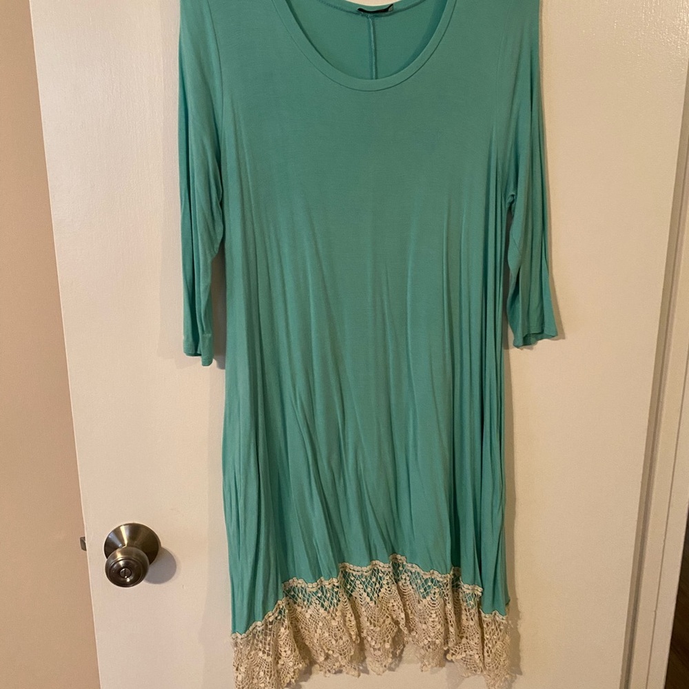 Boutique long sleeve dress with lace appliqué hem